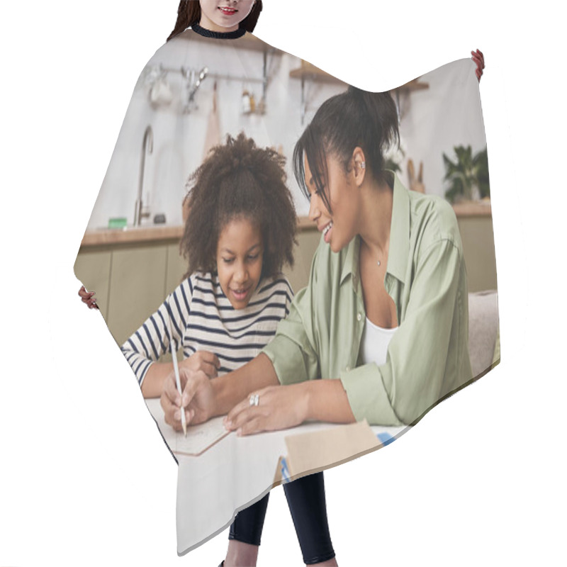 Personality  A Mother Guides Her Daughter With Joy While They Explore Their Creative Side At Home. Hair Cutting Cape