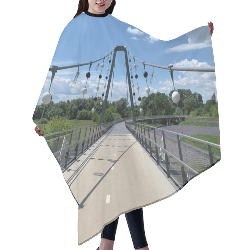 Personality  Marchegg, Ganserndorf, Lower Austria - May 26, 2022: Modern Bicycle And Pedestrian Bridge (VysoMarch) Crossing March River Between Austria And Slovakia. Balls And Flags For Bird Protection. Hair Cutting Cape