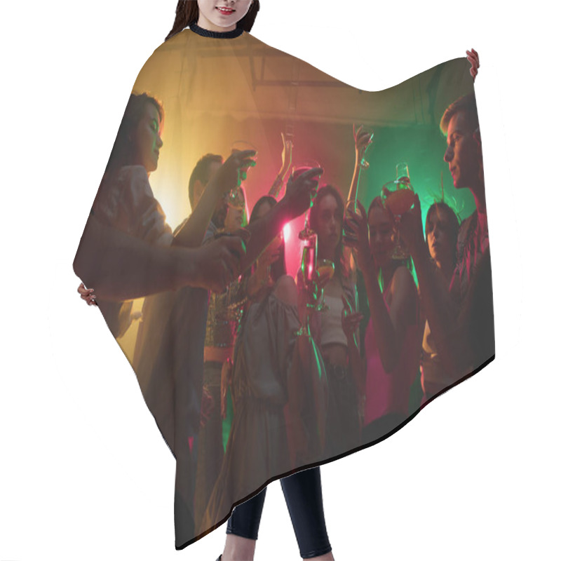 Personality  A Crowd Of People In Silhouette Raises Their Hands On Dancefloor On Neon Light Background Hair Cutting Cape