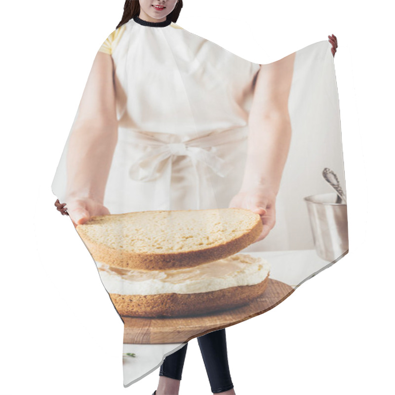 Personality  Cropped Shot Of Woman Making Delicious Layered Cake On White Hair Cutting Cape