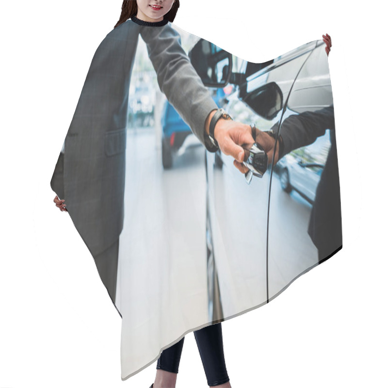 Personality  Cropped View Of Man Opening Car Door In Car Showroom  Hair Cutting Cape