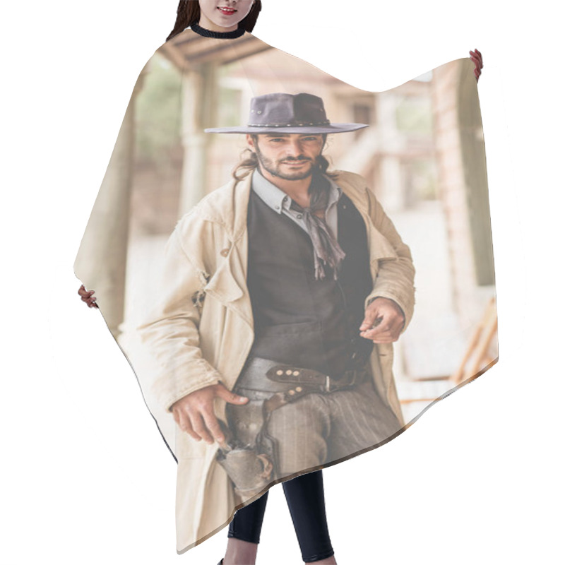 Personality  Portrait Of Cowboy On Porch On Wild West Film Set, Fort Bravo, Tabernas, Almeria, Spain Hair Cutting Cape