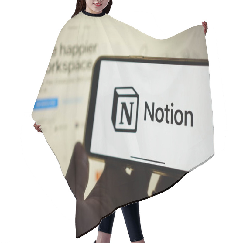 Personality  Roosendaal, The Netherlands - February 2, 2025: A Mobile Phone Screen Displaying The Logo Of Notion, An All-in-one Customizable Project Management App, With The Company Website In The Background. Hair Cutting Cape