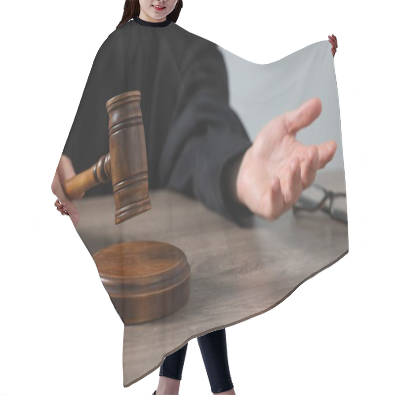 Personality  Judge With Gavel Sitting At Wooden Table Against Light Grey Background, Closeup Hair Cutting Cape