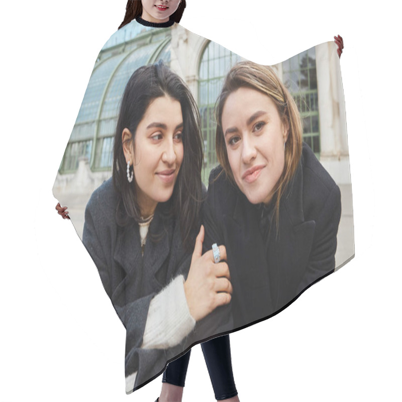 Personality  Portrait Of Happy Lesbian Woman Looking At Her Girlfriend Near Palmenhaus In Vienna On Background Hair Cutting Cape