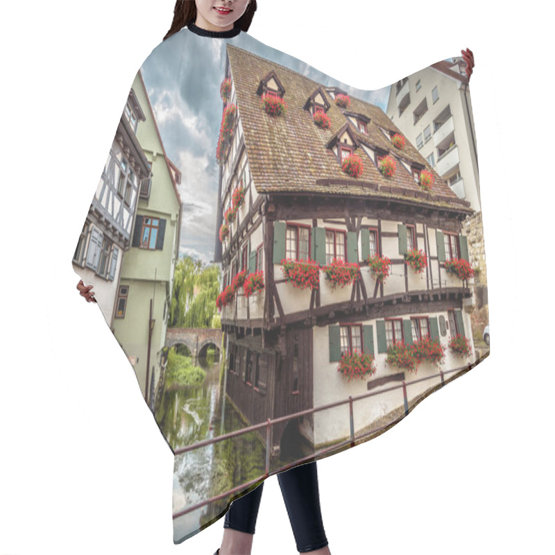 Personality  Crooked House Or Hotel Schiefes Haus In Ulm, Germany. It Is Landmark Of Ulm Located In Old Fisherman`s Quarter. View Of Vintage Half-timbered House In Medieval District Of Ulm City In Summer. Hair Cutting Cape