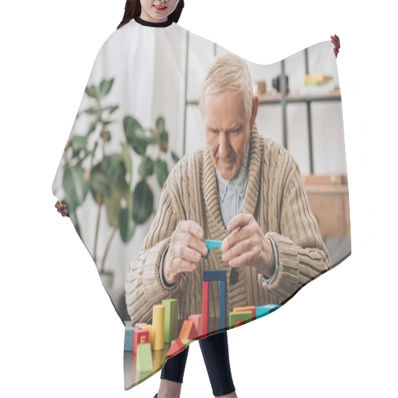 Personality  Senior Man Playing With Wooden Shapes At Home Hair Cutting Cape