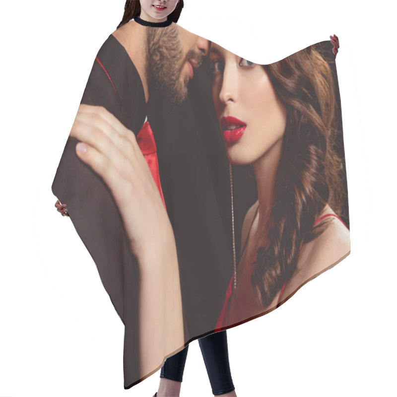 Personality  Side View Of Beautiful Girl With Red Lips Looking At Camera While Embracing Boyfriend Isolated On Black Hair Cutting Cape