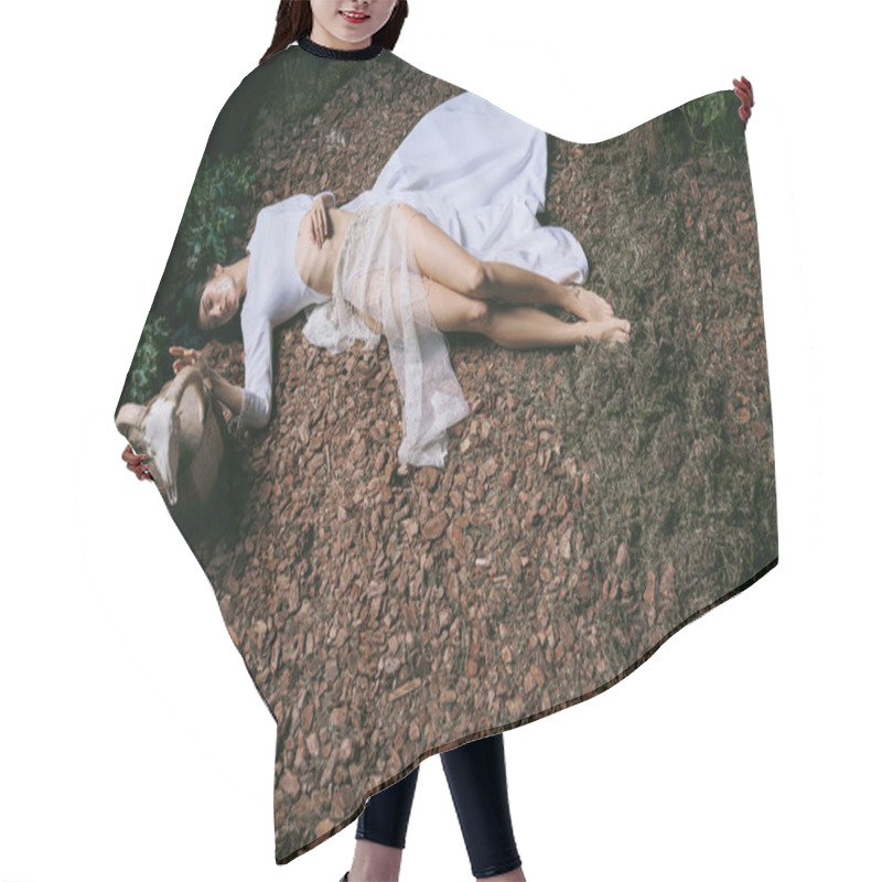 Personality  A Woman Lies On The Ground, Wearing A White Dress. Hair Cutting Cape