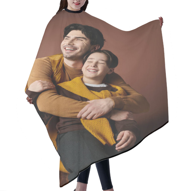 Personality  A Father And Son Share A Warm Embrace, Both Beaming With Joy And Laughter. Hair Cutting Cape