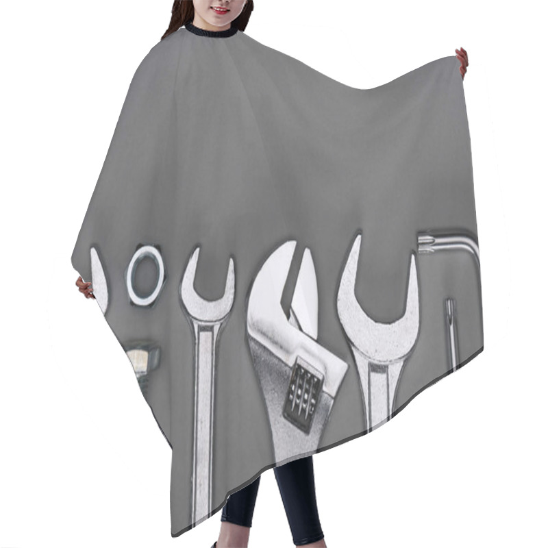 Personality  Top View Of Set Of Various Work Tools On Grey Hair Cutting Cape