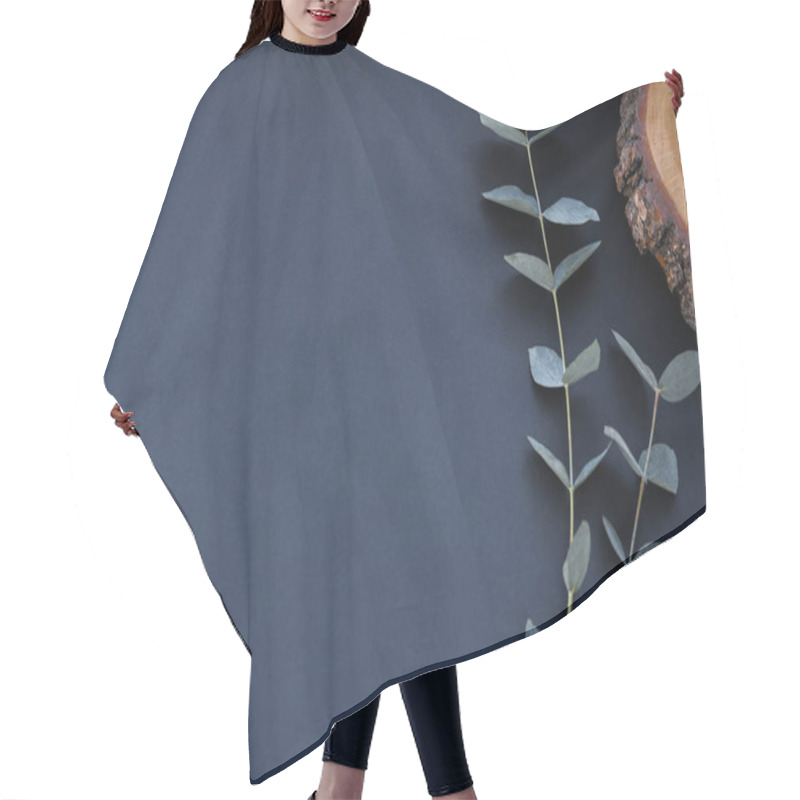 Personality  Grey Eucalyptus On The Background Paper.Copy Space. Hair Cutting Cape