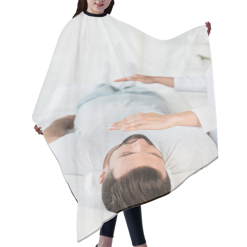 Personality  Cropped View Of Healer With Hands Above Body Of Bearded Man With Closed Eyes  Hair Cutting Cape