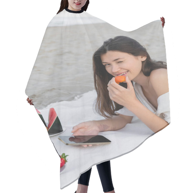 Personality  Young Woman In Shirt Holding Apricot And Using Smartphone Near Fruits On Beach  Hair Cutting Cape