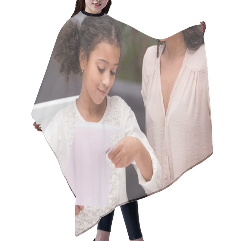 Personality  Cropped Image Of African American Daughter Cutting Paper For Greeting Card Hair Cutting Cape