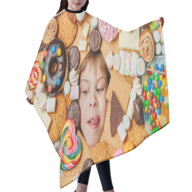 Personality  Funny 5 Years Old Girl Lying Under Plenty Of Sweet Foods. Panoramic Banner Of Kids Face Surrounded By Unhealthy Food. Top View, Flat Lay. Hair Cutting Cape