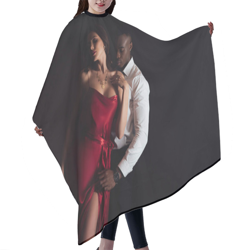 Personality  African American Man Embracing Beautiful Seductive Woman In Red Dress Isolated On Black With Copy Space Hair Cutting Cape