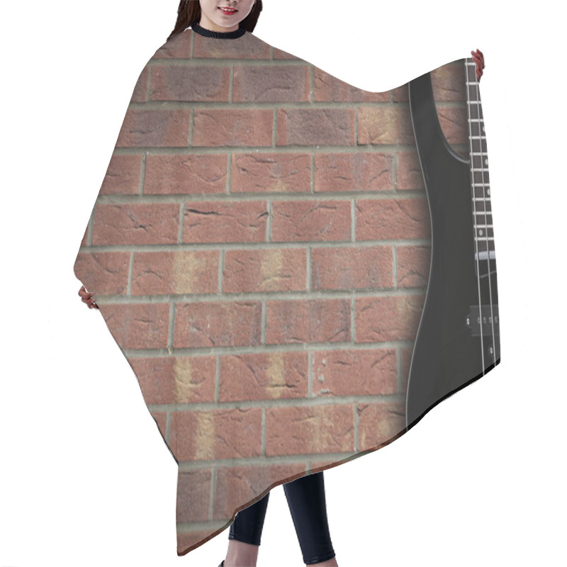 Personality  Bass Guitar On Brick Background With Copy Space Hair Cutting Cape