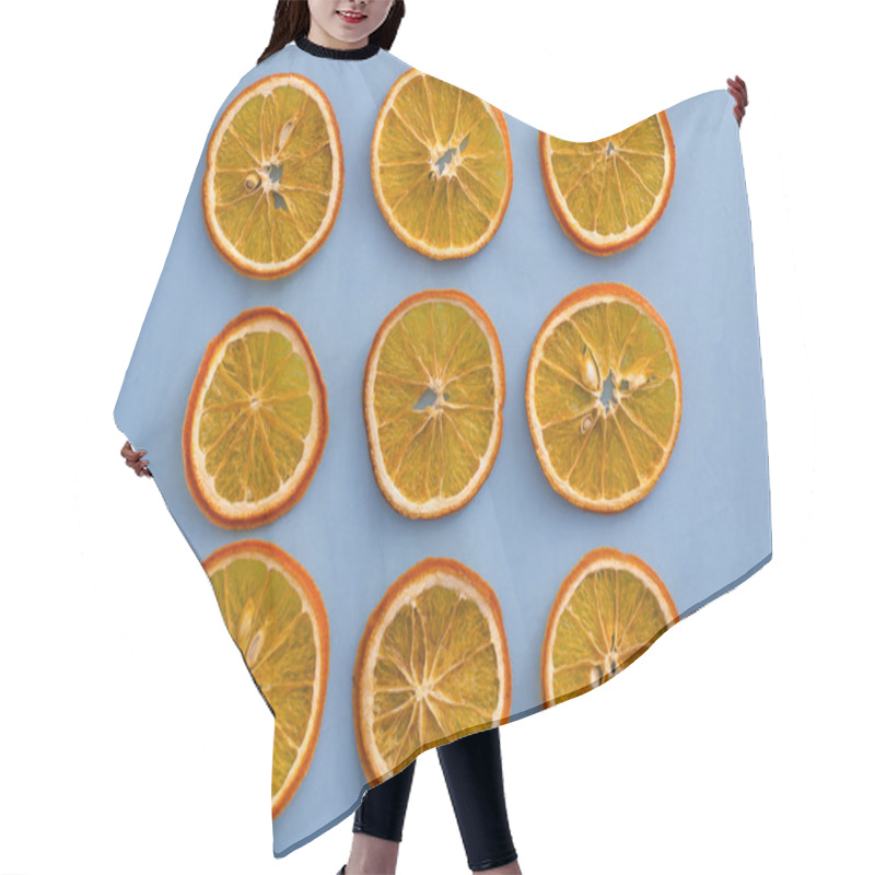 Personality  Dried Slices Oranges Citrus Fruit On Light Blue Background. Homemade Natural Aroma Decor. Concept Of Holiday. Marry Christmas. Close Up, Flat Lay, Top View. Hair Cutting Cape