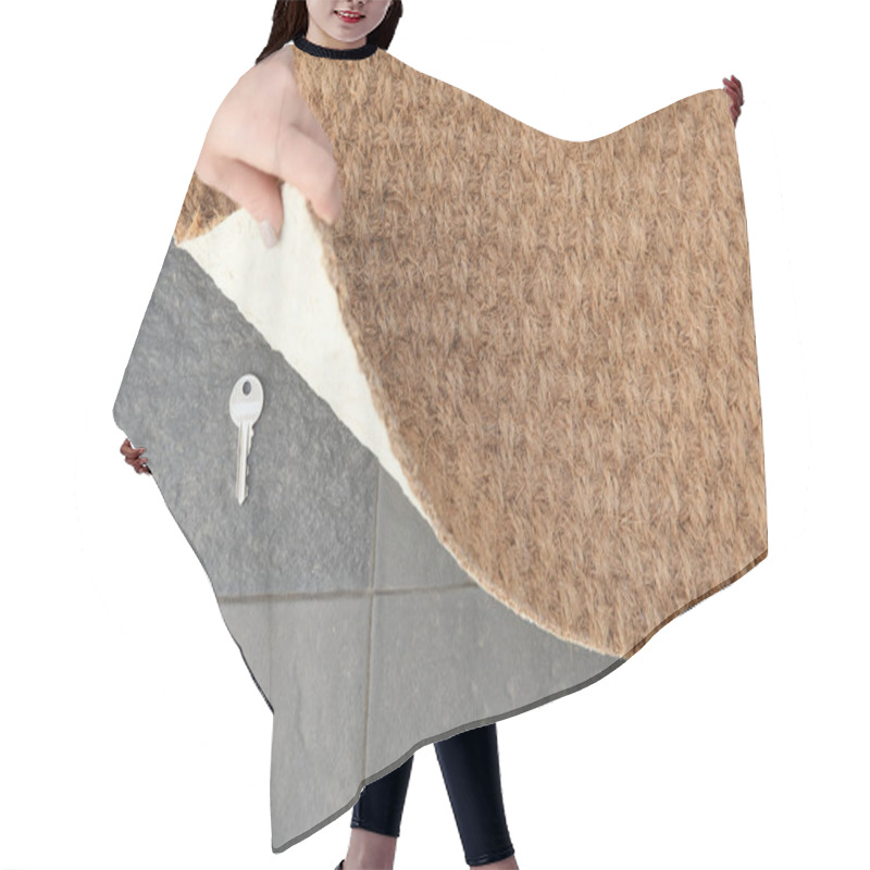 Personality  Young Woman Revealing Hidden Key Under Door Mat, Top View With Space For Text Hair Cutting Cape