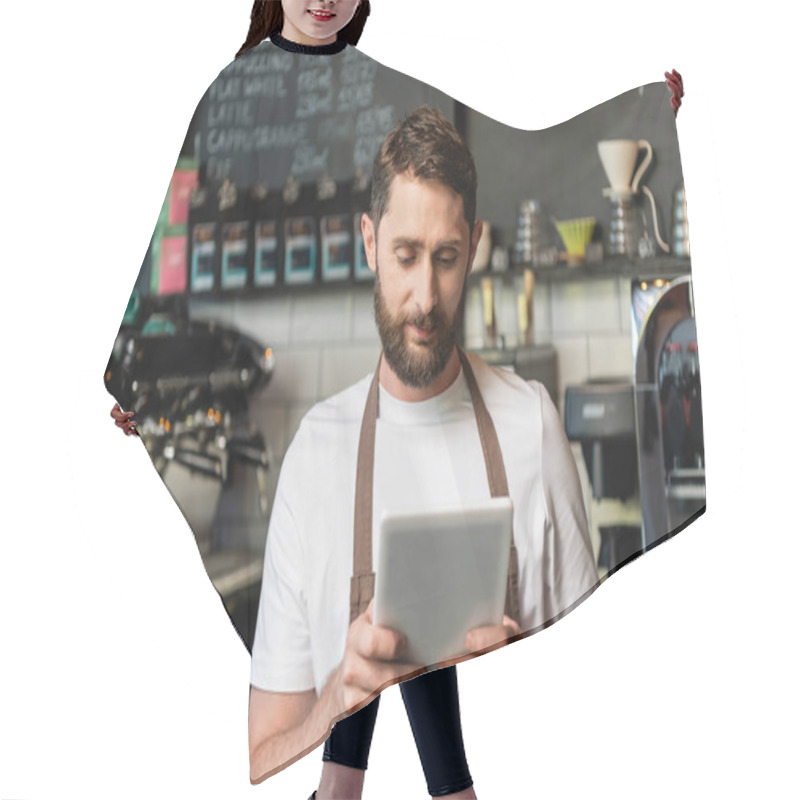 Personality  Barista In Apron Using Digital Tablet While Working And Standing Near Bar In Coffee Shop Hair Cutting Cape