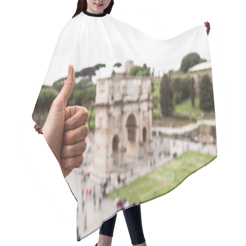 Personality  ROME, ITALY - JUNE 28, 2019: Partial View Of Man Showing Thumb Up In Front Of Arch Of Constantine Hair Cutting Cape