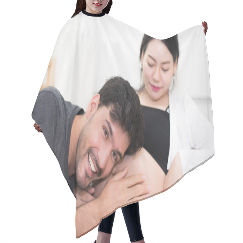 Personality  Father Hearing His Son Or Daughter Kicking Sound Inside Mother Belly When Sitting On Lying On Bed At Home. Family And Lovers Concept. Happy Sweet Home And Wedding Theme Hair Cutting Cape