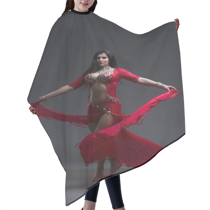 Personality  Young Beautiful Exotic Eastern Women Performs Belly Dance In Ethnic Red Dress On Gray Background Hair Cutting Cape