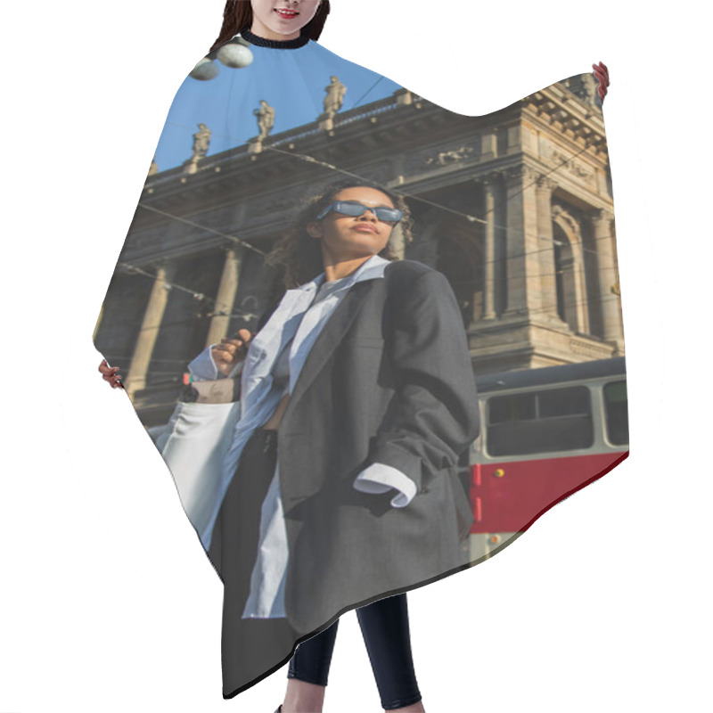 Personality  Low Angle View Of Young African American Woman In Sunglasses Posing Near National Theatre In Prague Hair Cutting Cape