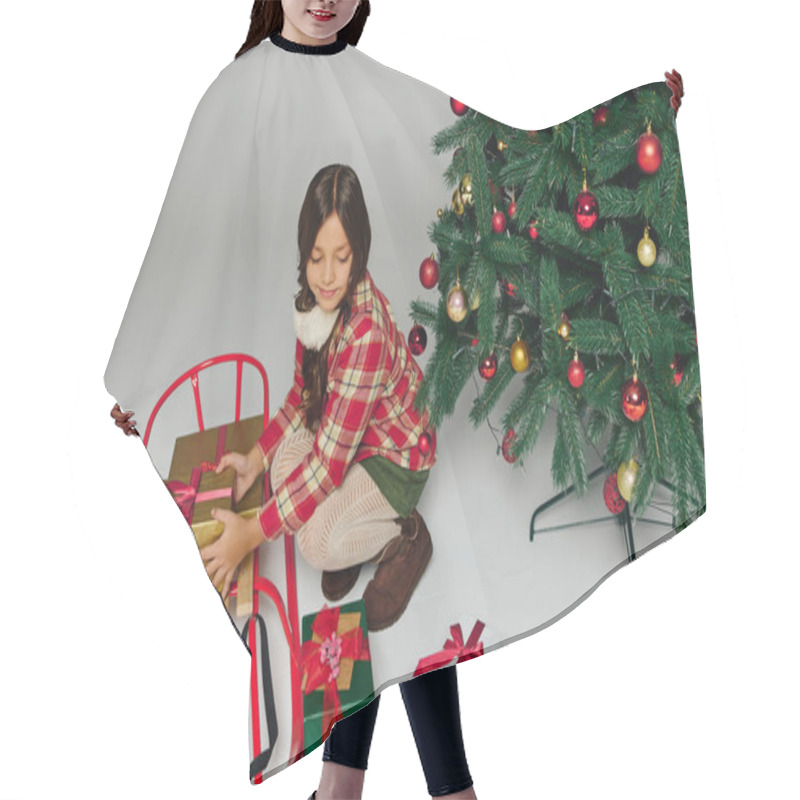 Personality  A Girl Happily Arranges Presents On A Festive Sled Beside A Beautifully Decorated Christmas Tree. Hair Cutting Cape