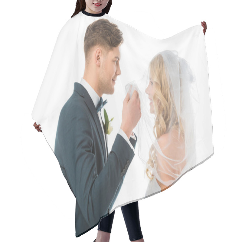 Personality  Happy Groom Looking At Smiling Brides Face While Lifting Bridal Veil Isolated On White Hair Cutting Cape