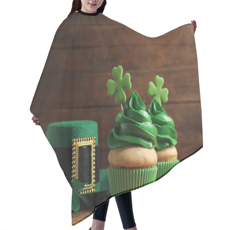 Personality  Composition With Delicious Decorated Cupcakes On Wooden Table. St. Patrick's Day Celebration Hair Cutting Cape