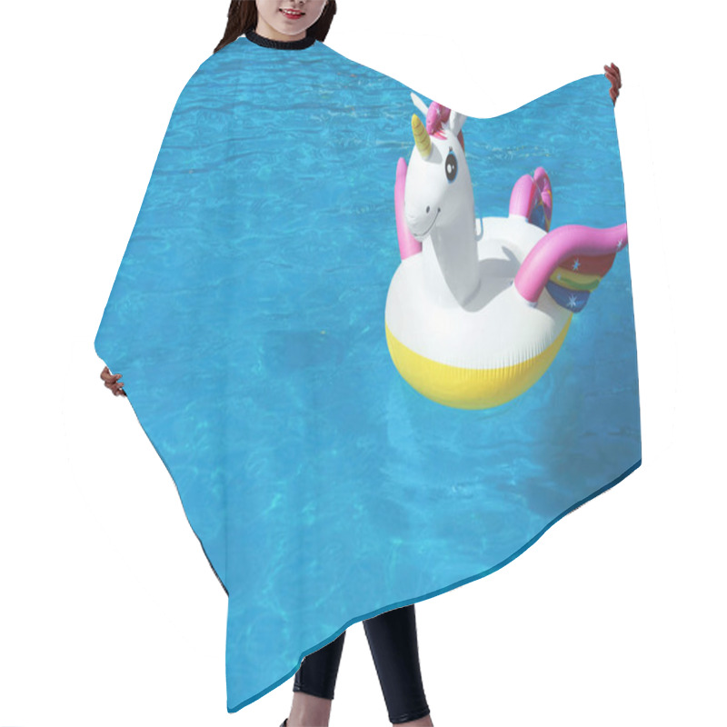 Personality  Funny Inflatable Unicorn Ring Floating In Swimming Pool On Sunny Day. Space For Text Hair Cutting Cape