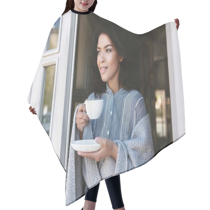 Personality  Portrait Of Beautiful Lady Wrapped In Plaid With Cup Of Coffee In Hands. Cute African American Girl Drinking Coffee In Restaurant Hair Cutting Cape