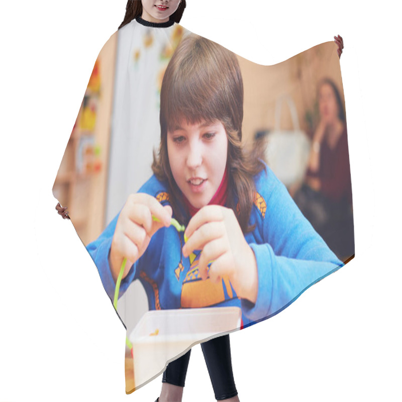 Personality  Happy Kid With Disability Develops Fine Motor Skills At Rehabilitation Center For Kids With Special Needs Hair Cutting Cape