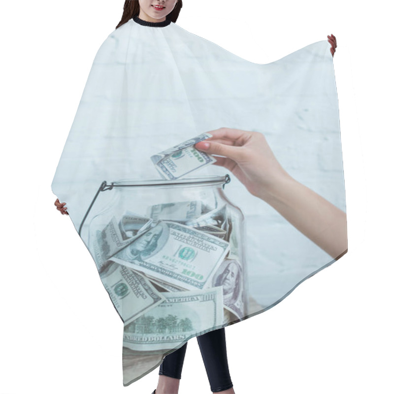 Personality  Cropped View Of Female Hand Putting Dollar Banknote Into Glass Jar Hair Cutting Cape