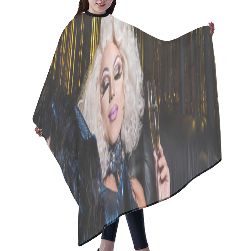 Personality  Pleased Drag Queen In Blonde Wig Holding Champagne Glass On Shiny Background, Banner  Hair Cutting Cape