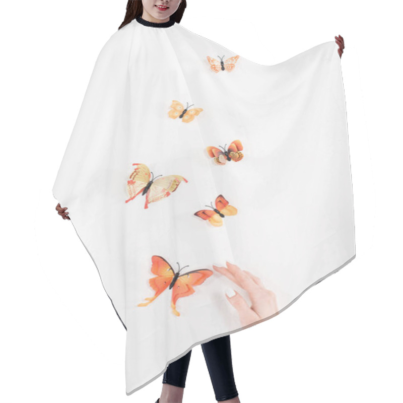 Personality  Cropped View Of Female Hand Near Orange Butterflies Flying On White Background, Environmental Saving Concept  Hair Cutting Cape