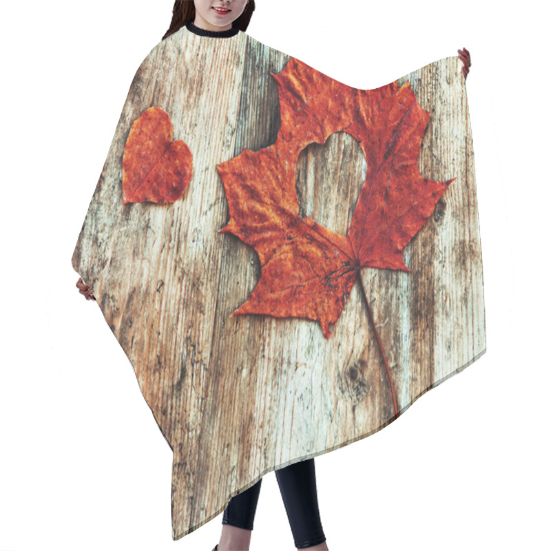 Personality  A Red Leaf With A Cut-out Heart On A Wooden Background Hair Cutting Cape