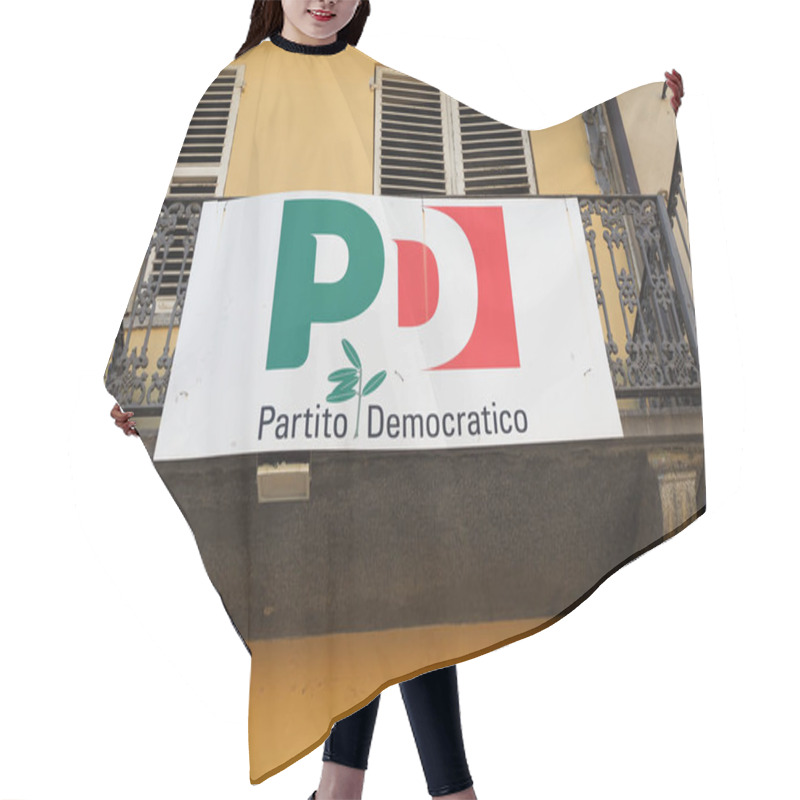 Personality  RIVOLI, ITALY - CIRCA FEBRUARY 2019: Partito Democratico (meaning Democratic Party) Headquarters Hair Cutting Cape