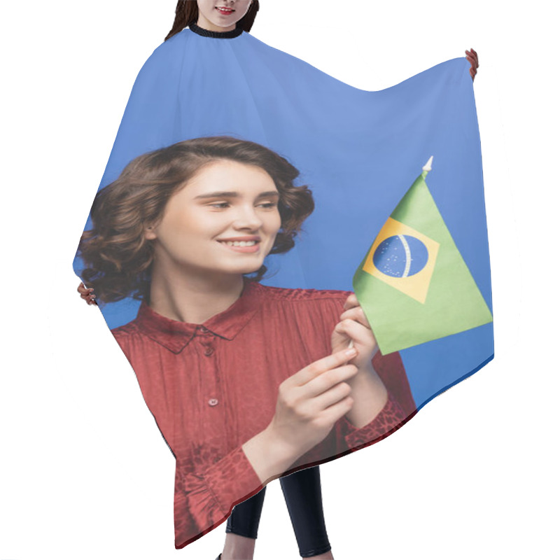 Personality  Cheerful Language Teacher Smiling While Holding Flag Of Brazil Isolated On Blue  Hair Cutting Cape