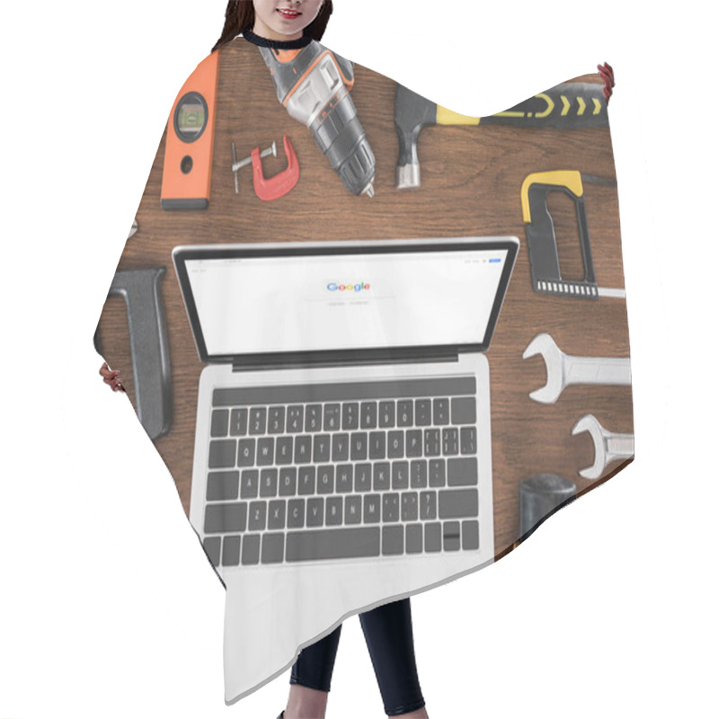 Personality  Top View Of Workplace With Laptop With Google On Screen Surrounded By Various Tools On Wooden Table  Hair Cutting Cape