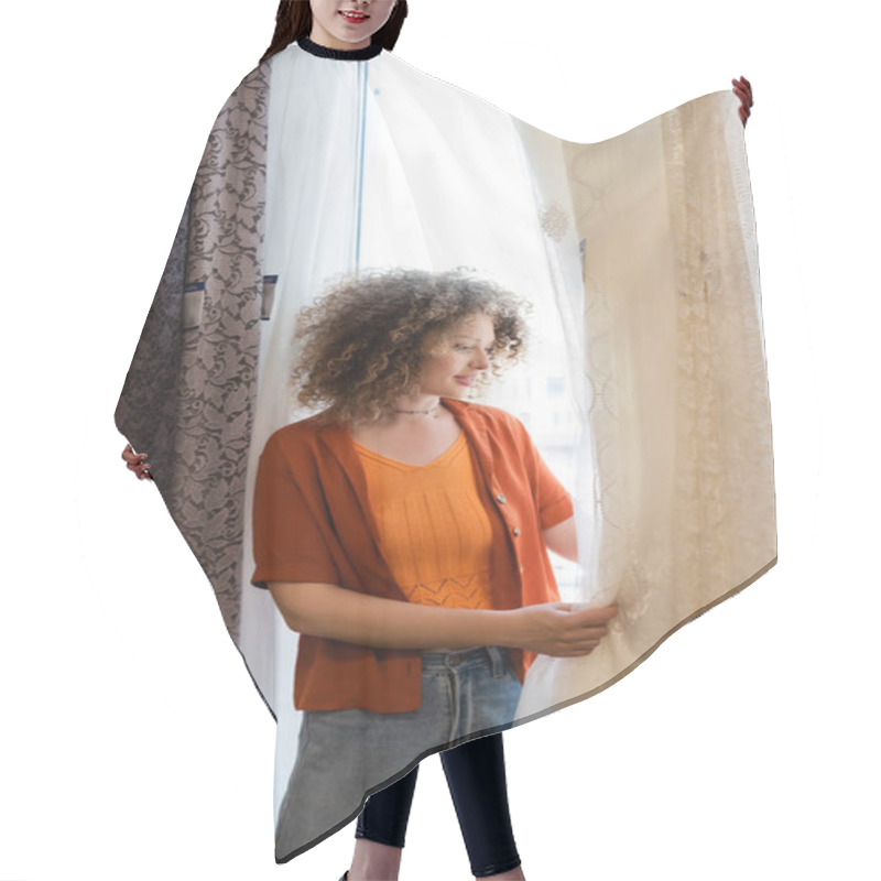 Personality  Young And Curly Woman Choosing Curtains In Textile Shop Hair Cutting Cape