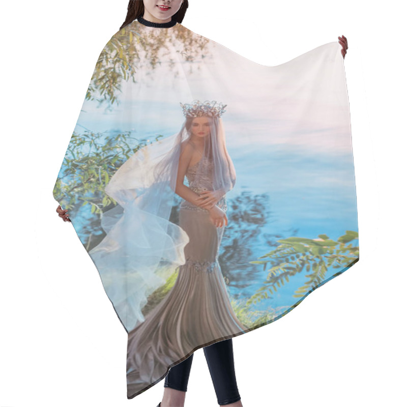 Personality  Beauty Elegant Sad Woman Queen Stands On Shore Fantasy Lake Waiting. Face Under Veil Fabric Flies In Wind. Vintage Medieval Silver Crown Princess Long Royal Dress. Summer Nature Green Tree Magic Light Hair Cutting Cape