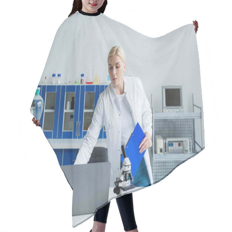 Personality  Scientist Holding Clipboard Near Laptop And Test Tubes In Lab  Hair Cutting Cape