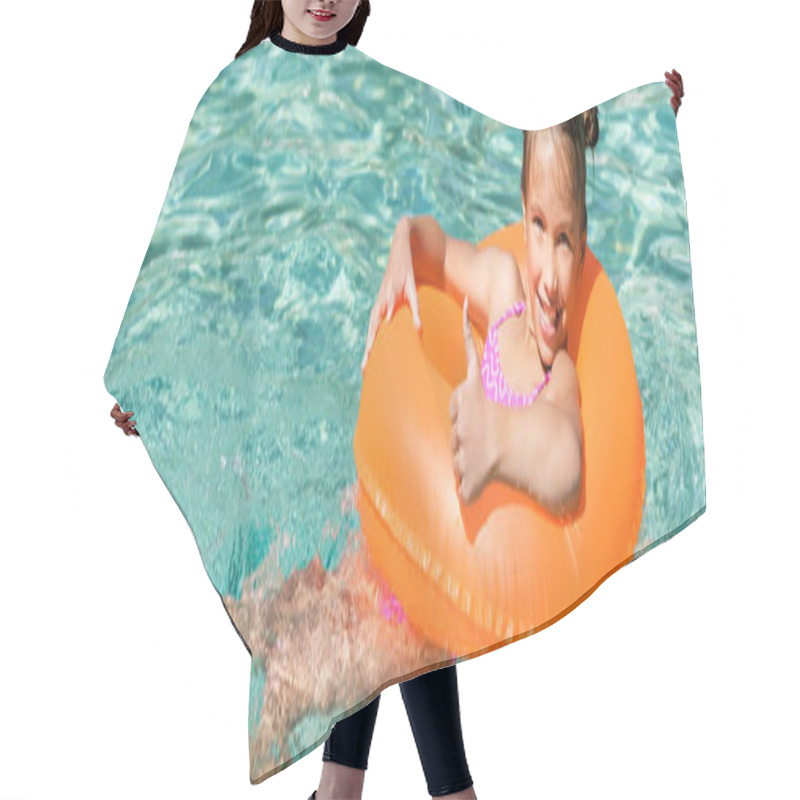 Personality  Horizontal Crop Of Joyful Girl Showing Thumb Up While Floating In Pool On Inflatable Ring Hair Cutting Cape