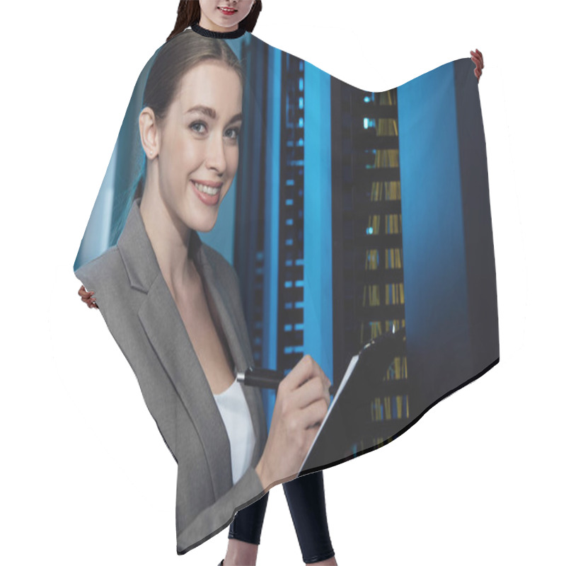 Personality  Cheerful Businesswoman Writing While Holding Clipboard In Server Room  Hair Cutting Cape