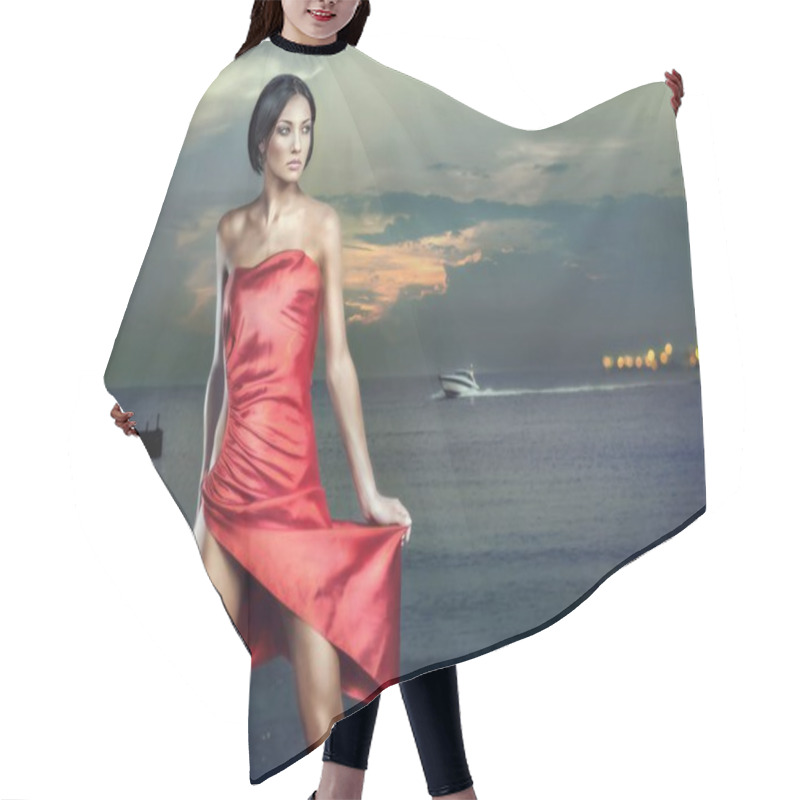 Personality  Portrait Of Beautiful Elegant Young Brunette, Posing In Evening Red Dress On Sea Quay Hair Cutting Cape