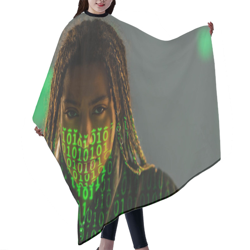 Personality  Portrait Of African American Woman With Projection Of Binary Code Looking At Camera On Grey Background  Hair Cutting Cape