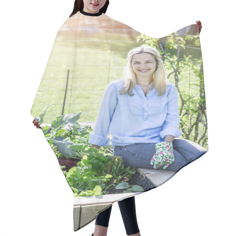 Personality  Happy Proud Woman Sitting On Own Wooden Raised Bed And Looking At Camera  Hair Cutting Cape